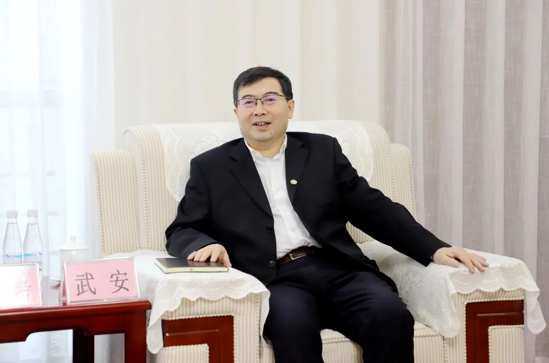 武安会见七台河市政府副市长钱言考一行